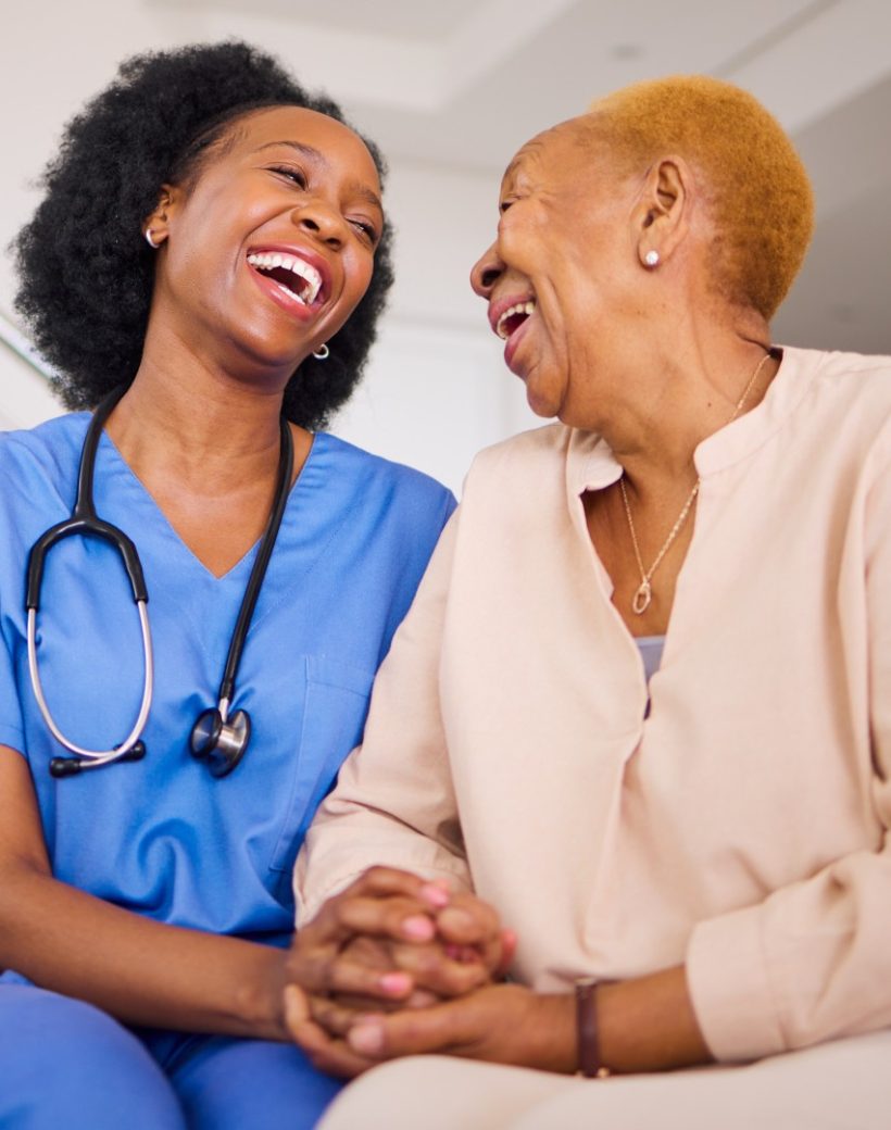 caregiver-and-senior-woman-laughing-together-indoo-2026-03-25-03-23-45-utc (Large)